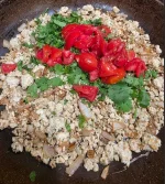 Chicken_Tomatoes_Onion_Rice_Cooking1.webp