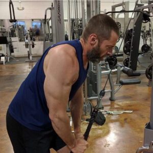 Hugh Jackman lifting weights